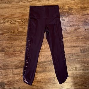 Worn once! Athleta- size small- 7/8 tight- burgundy like color